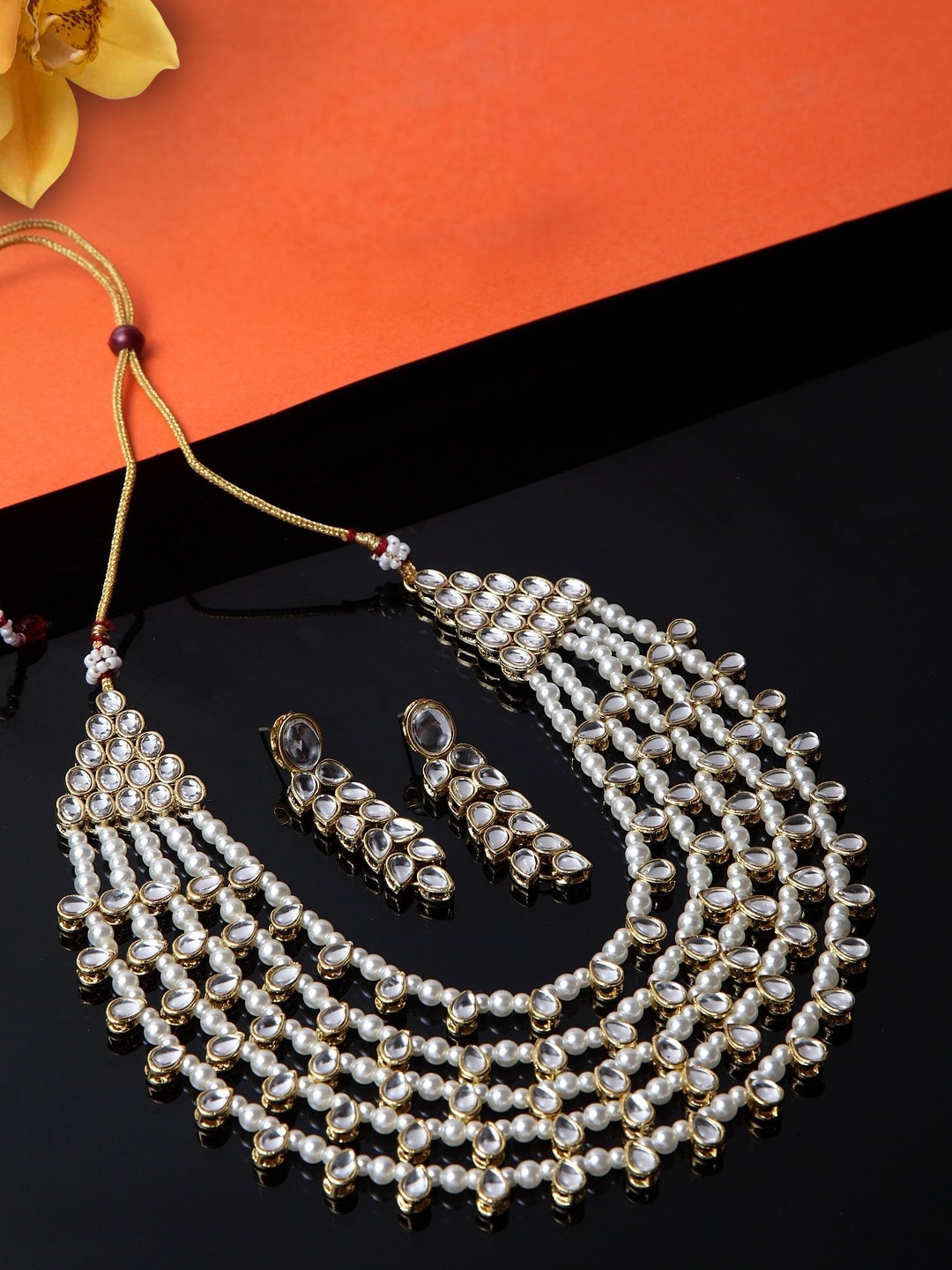 

Peora Gold Plated & White Handcrafted Pearl & Kundan Studded Jewellery Set