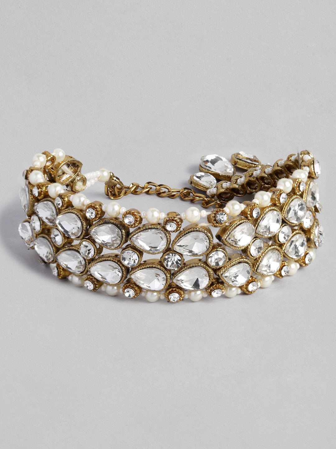 

Peora Women Gold-Plated White Stone Studded Tasselled Wraparound Bracelet