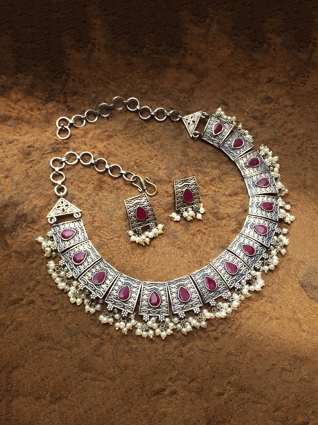 

Peora Red Oxidised Silver-Plated Stone Studded Handcrafted Jewellery Set