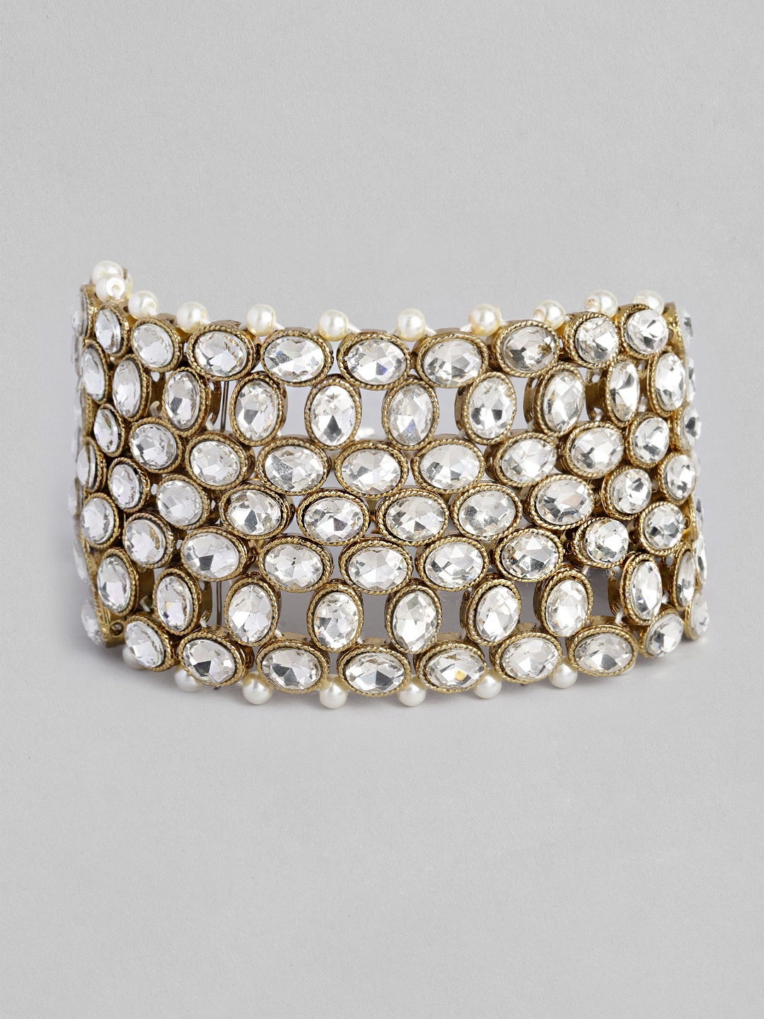 

Peora Women Gold-Plated White Stone Studded Tasselled Wraparound Bracelet
