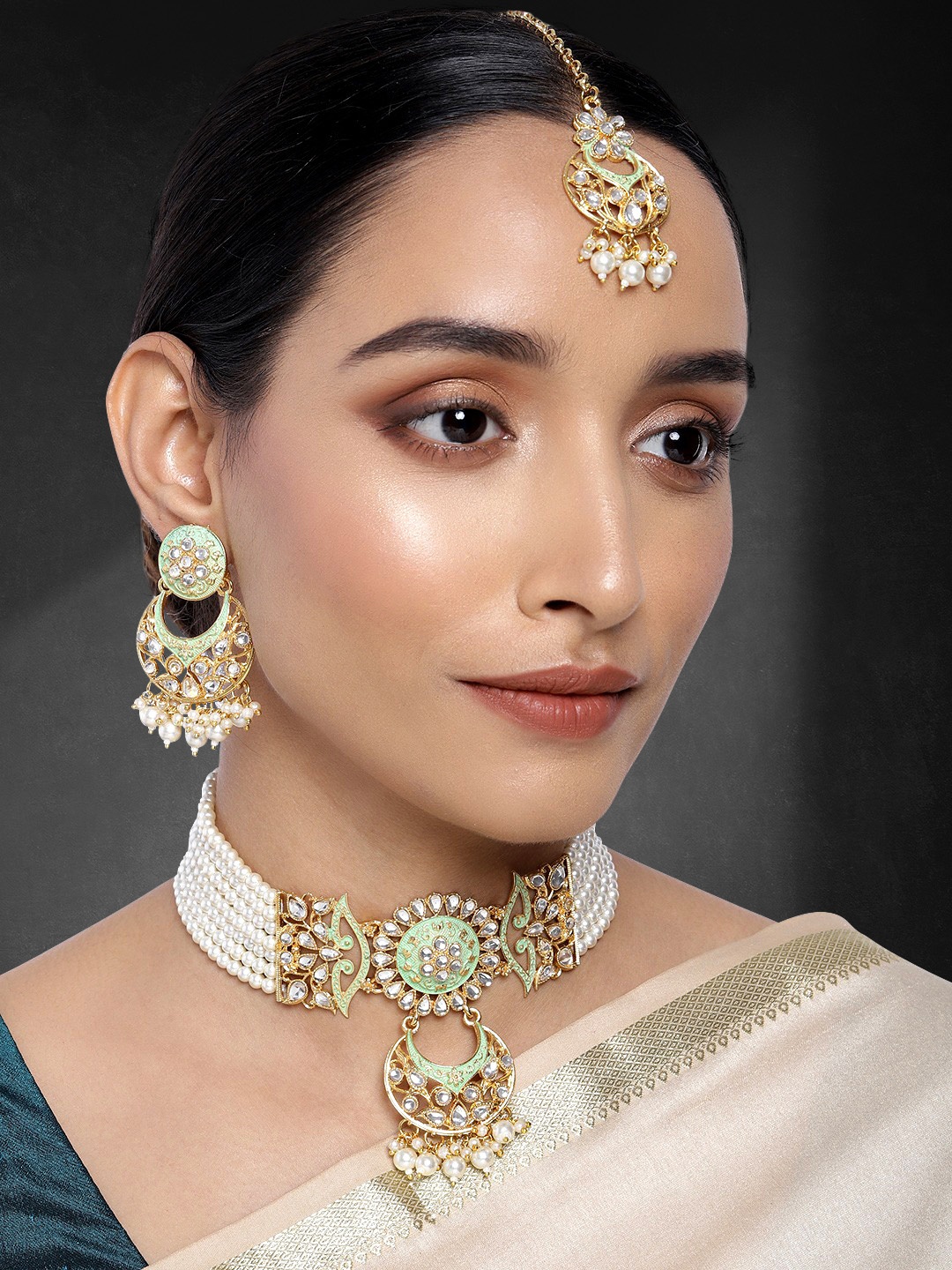 

Peora Gold Plated & Sea Green Meenakari Kundan Beaded Jewellery Set