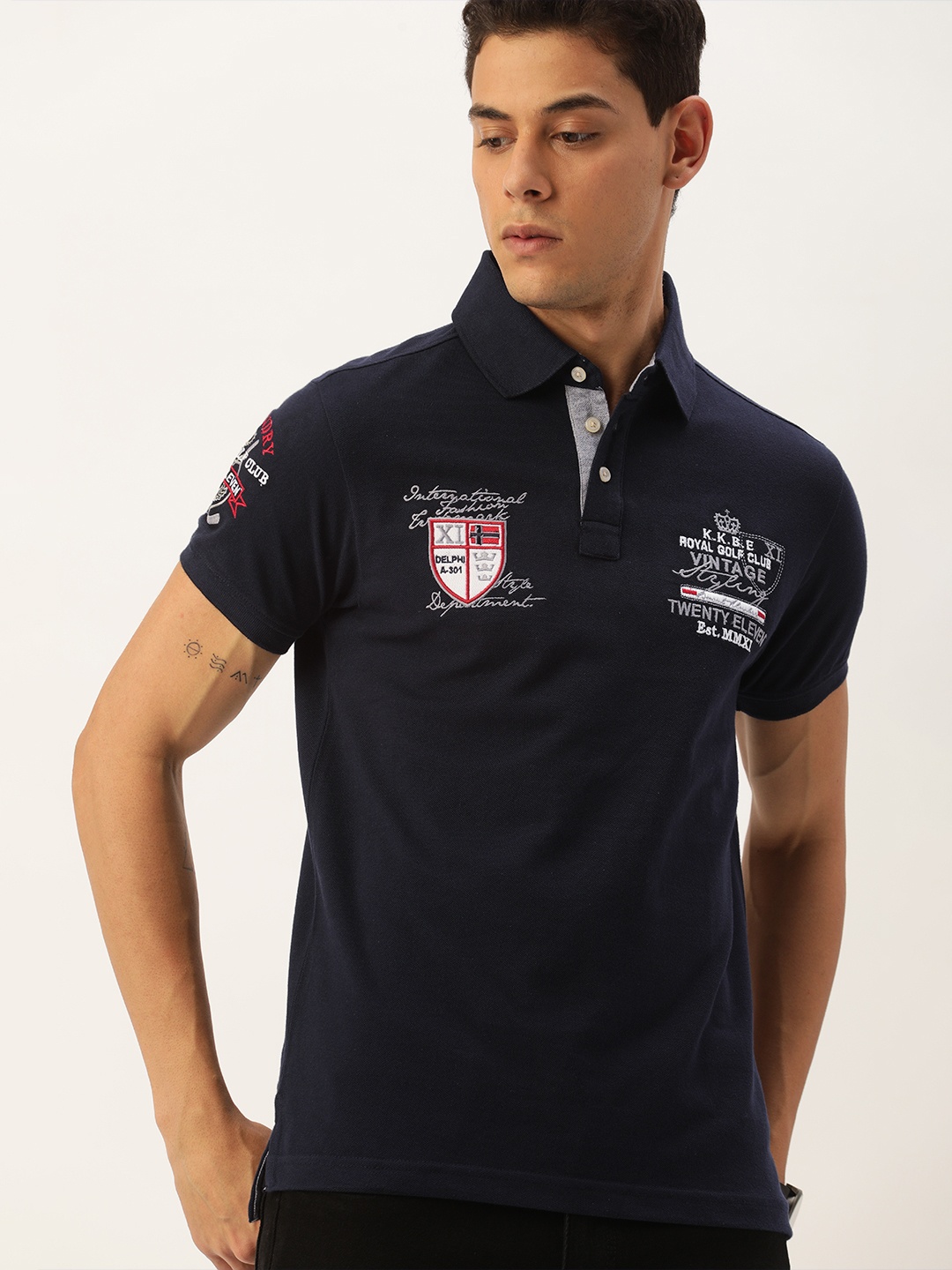 

Burnt Umber Men Navy Blue Brand Logo Printed Polo Collar Pure Cotton T-shirt