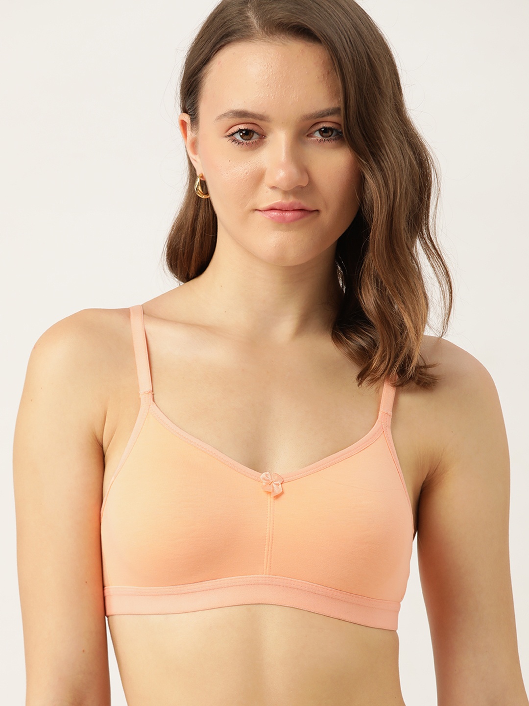 

DressBerry Peach-Coloured Solid T-shirt Bra