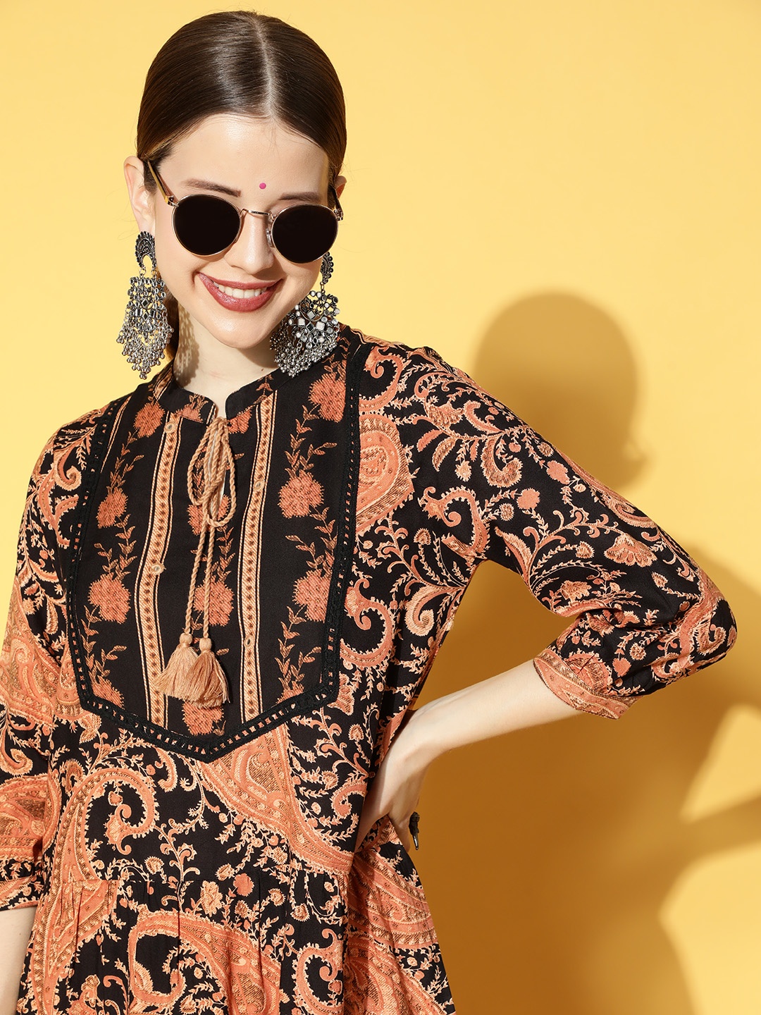 

Sangria Black & Peach-Coloured Ethnic Motifs Print Tie-Up Neck Midi A-Line Dress