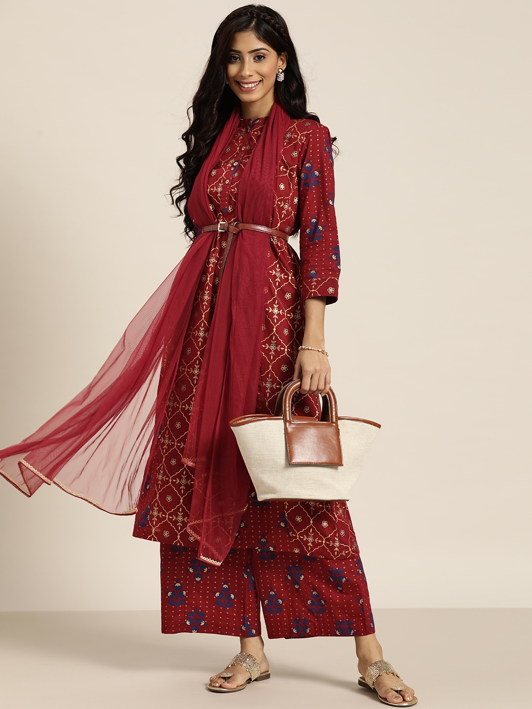 

Sangria Women Maroon & Golden Motifs Print Cotton A-line Kurta with Palazzos & Dupatta