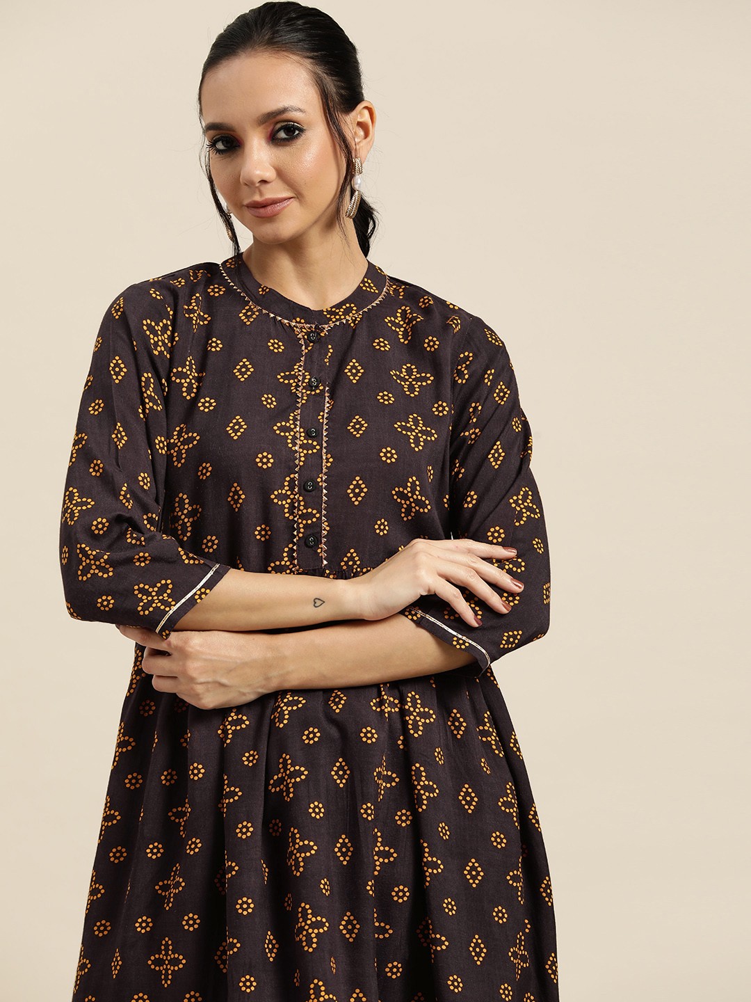 

Sangria Women Brown & Yellow Ethnic Motifs Printed Panelled Gotta Patti Kurta with Salwar