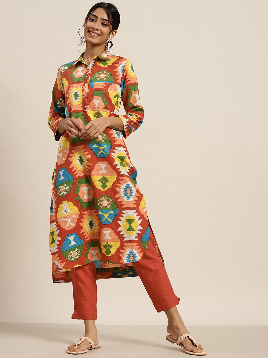 

Sangria Women Rust Orange & Yellow Geometric Print Cotton Straight Kurta with Palazzos