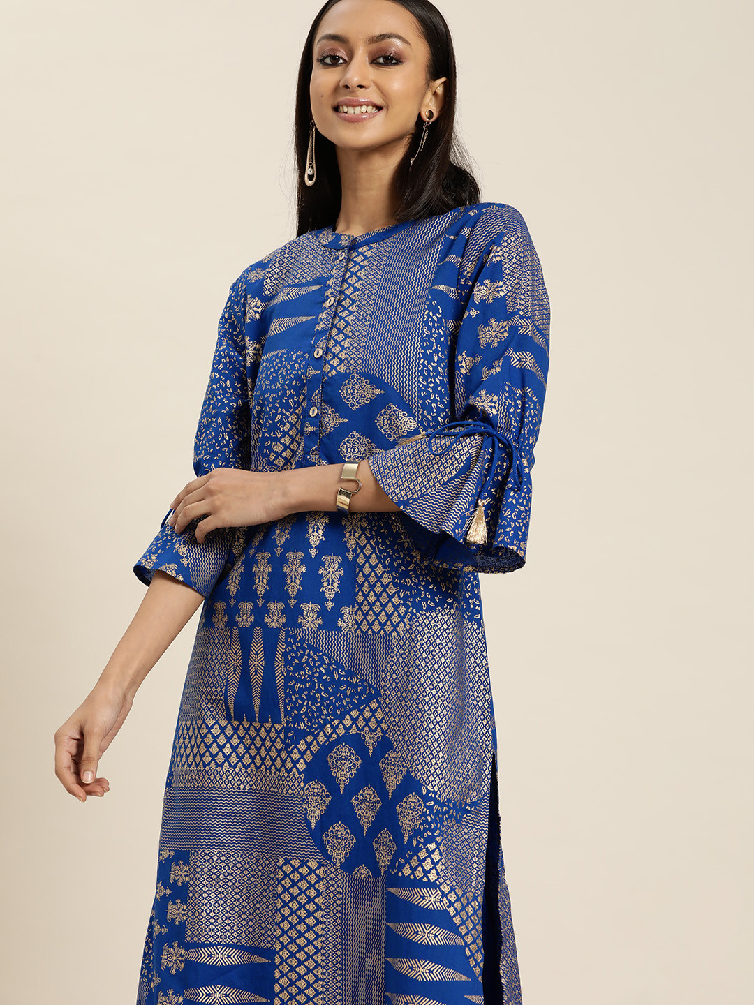 

Sangria Women Navy Blue & Golden Ethnic Motifs Printed Pure Cotton Kurta with Trousers