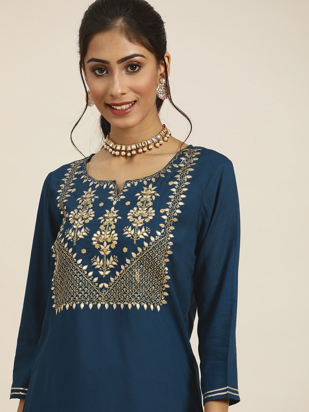 

Sangria Women Teal Blue & Golden Gotta Patti Yoke Design Straight Kurta