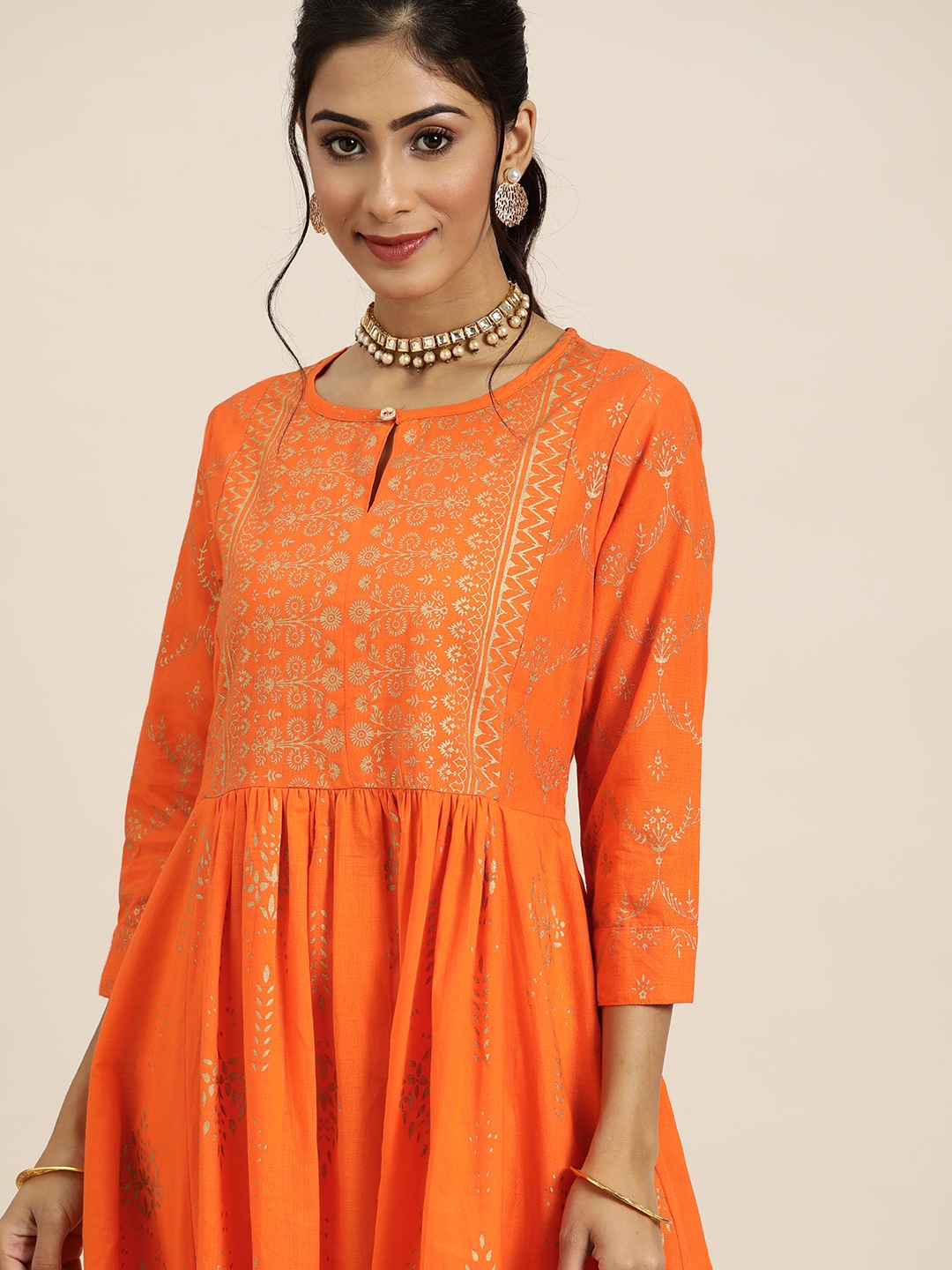 

Sangria Women Orange & Golden Cotton Ethnic Motifs Printed A-Line Kurta