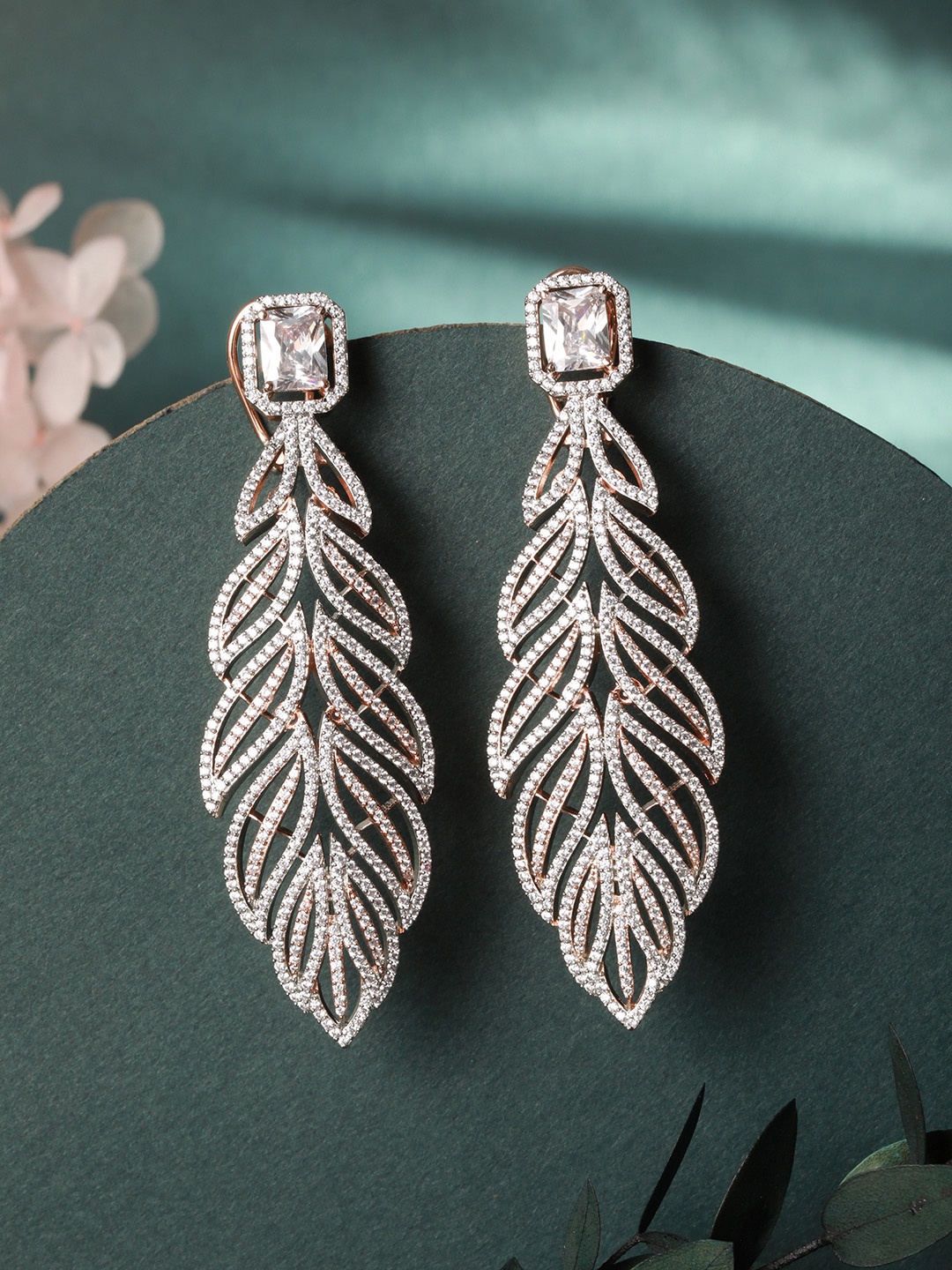 

Saraf RS Jewellery White & Rose Gold-Plated AD Feather Shaped Drop Earrings