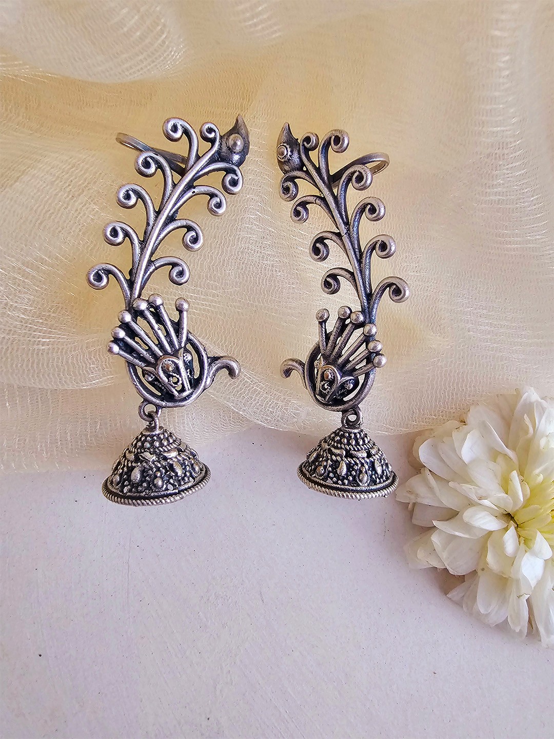 

Binnis Wardrobe Silver Peacock Shaped Jhumkas Earrings