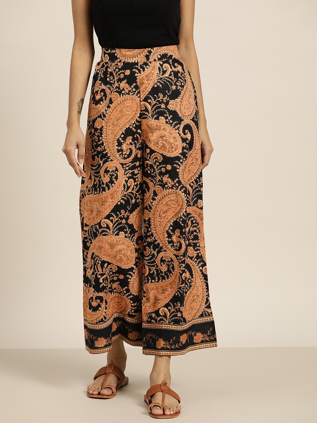 

Sangria Women Rust Orange & Black Ethnic Motifs Print Cotton Palazzos