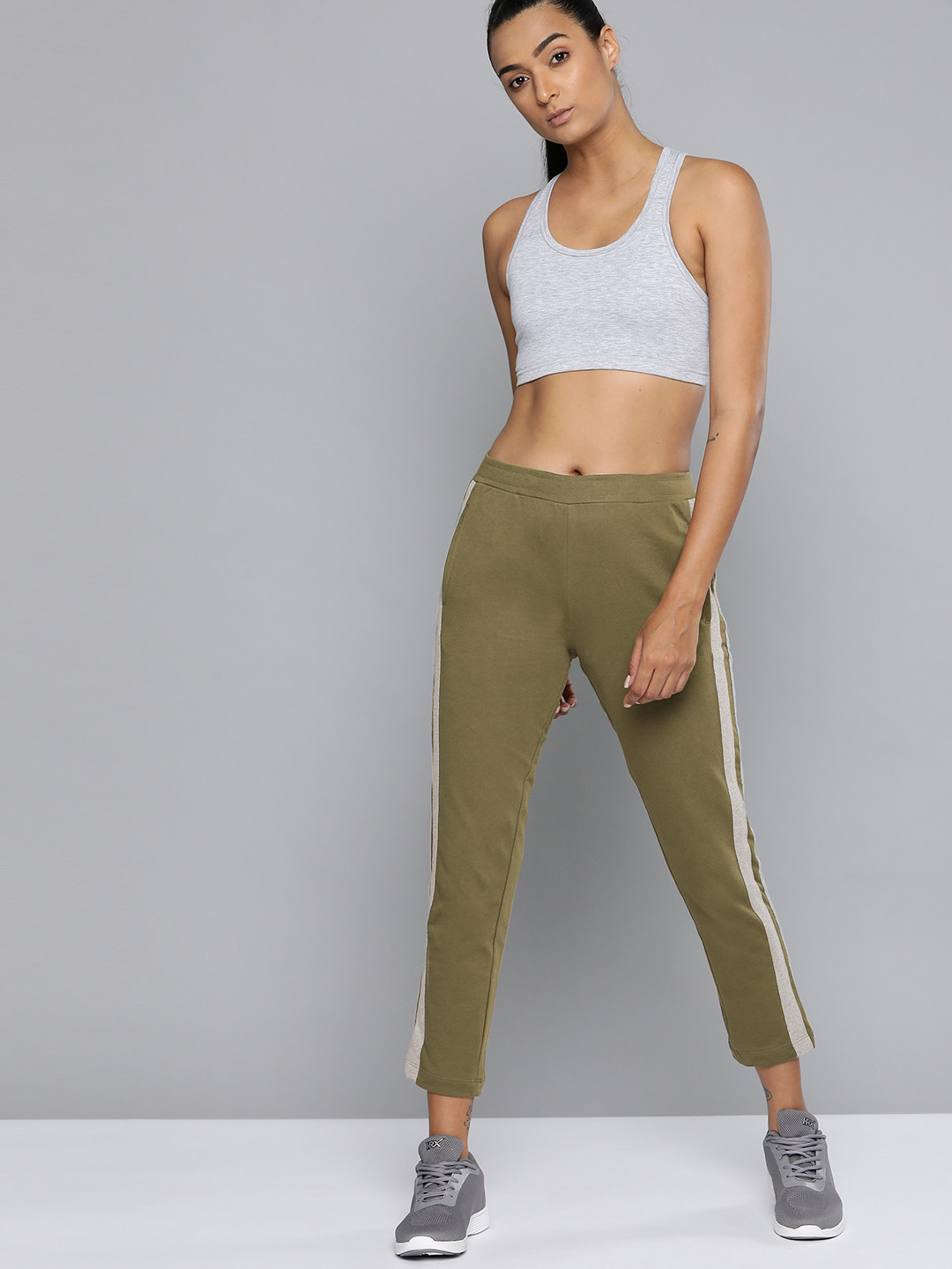 

HRX By Hrithik Roshan Women Brunt Oliva Solid Slim Fit Bio-Wash Lifestyle Track Pants, Olive