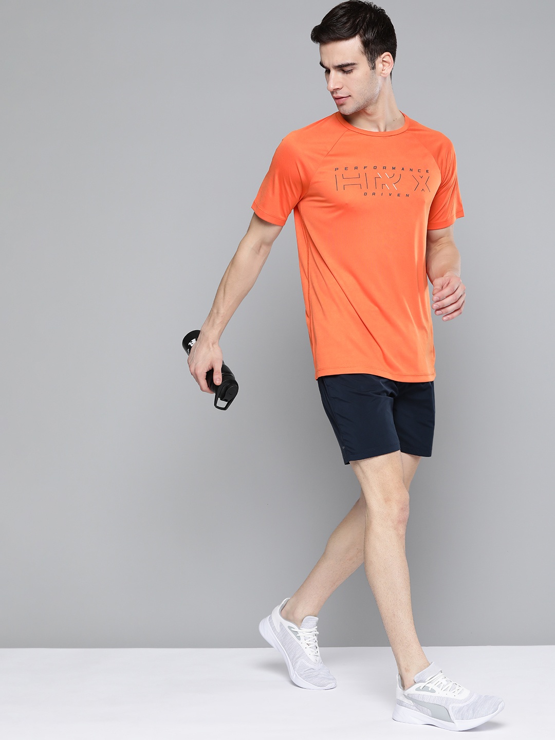 

HRX By Hrithik Roshan Men Koi Solid Rapid-Dry Antimicrobial Training Tshirt, Orange