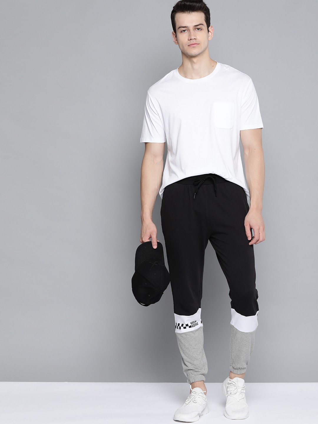 

HRX By Hrithik Roshan Men Jet Black Typographic Slim Fit Bio-Wash Lifestyle Joggers