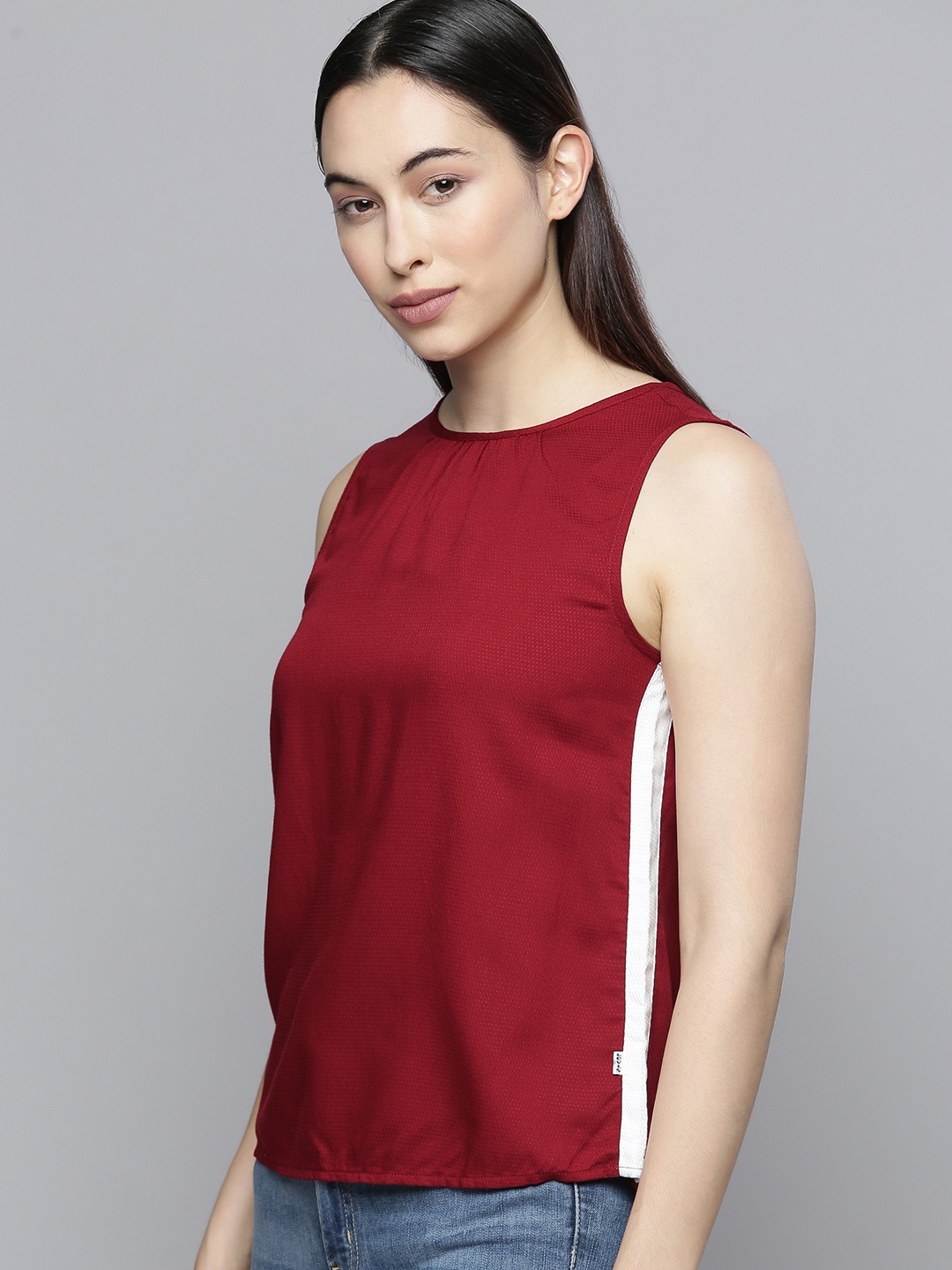 

Levis Women Maroon Solid Regular Sustainable Top