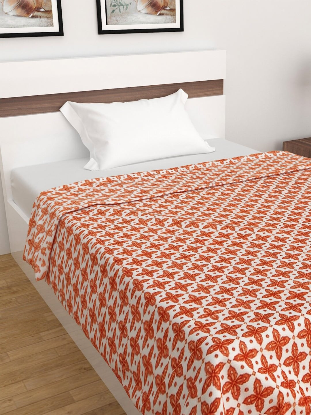 

Home Centre White & Orange Ethnic Motifs AC Room 210 GSM Single Bed Blanket