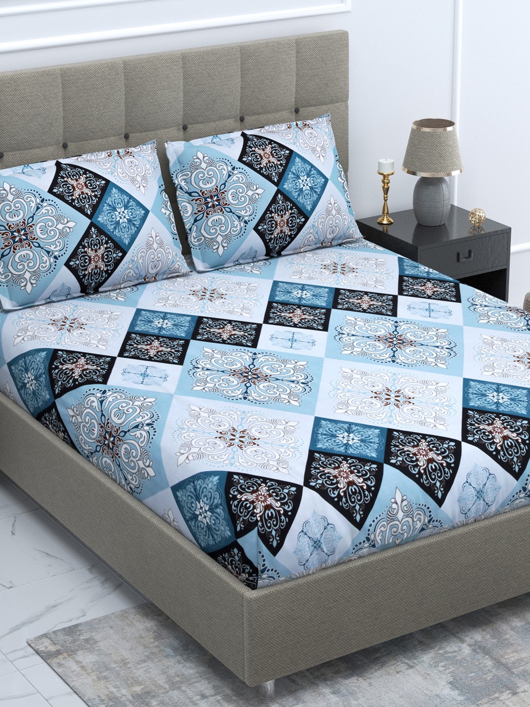 

DREAM WEAVERZ Blue & Black Ethnic Motifs 250 TC Cotton 1 King Bedsheet with 2 Pillow Covers