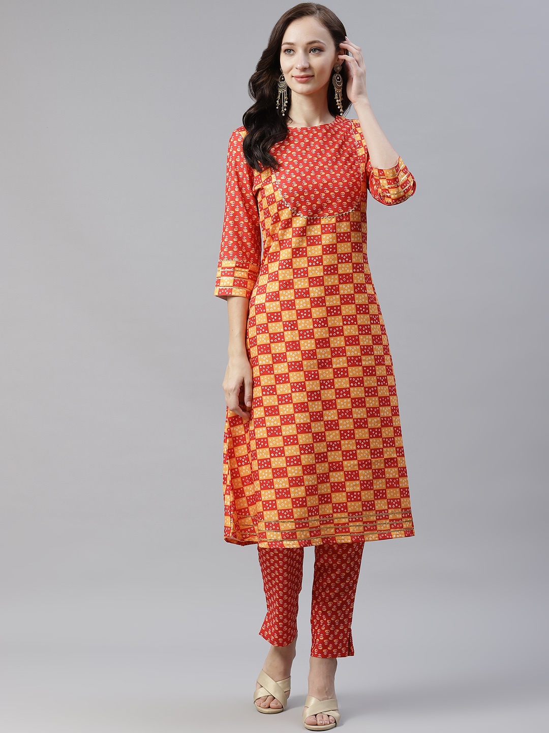 

ZIYAA Women Rust Orange & Yellow Ethnic Printed Regular Gotta Patti Kurta with Trousers