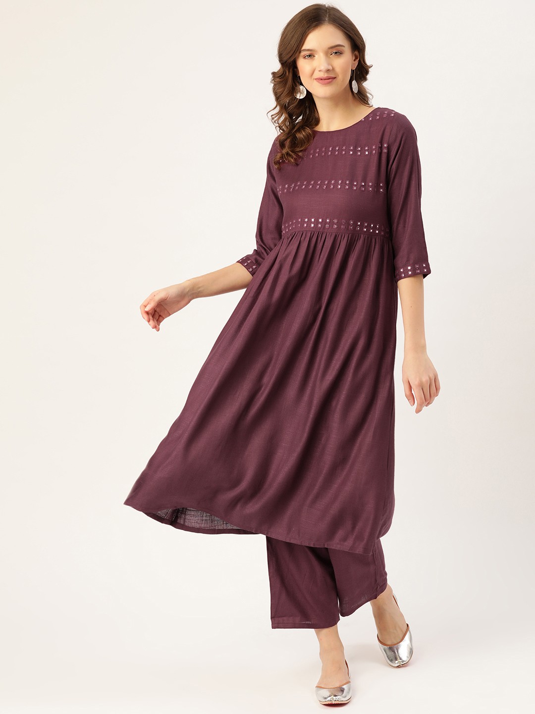 

Moda Rapido Women Maroon Solid Mirror Work Kurta with Trousers