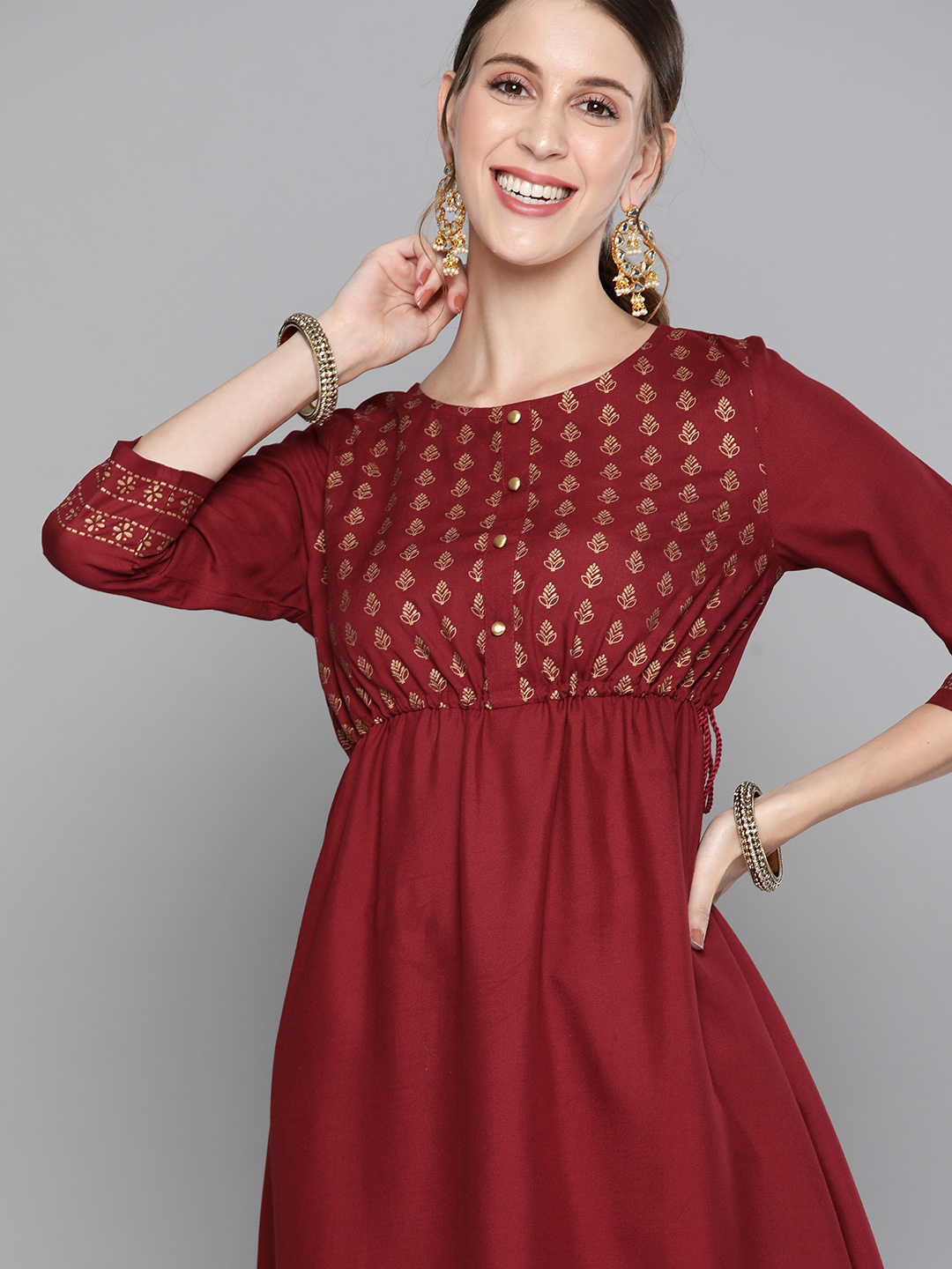 

HERE&NOW Women Maroon & Golden Ethnic Printed Toke Design Pleated Kurta with Palazzos