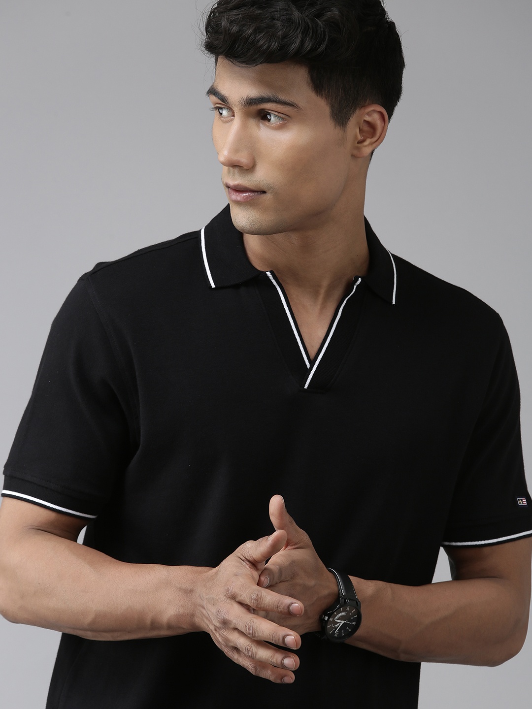 

Arrow Sport Men Black Polo Collar Pure Cotton T-shirt