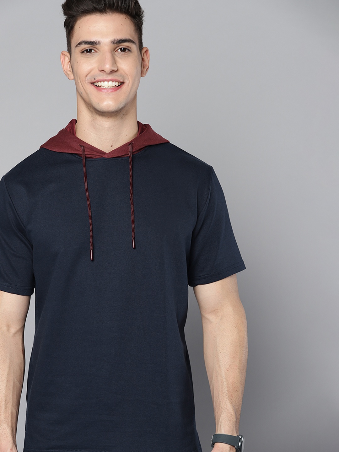 

Mast & Harbour Men Navy Blue Solid Hooded Sweatshirt
