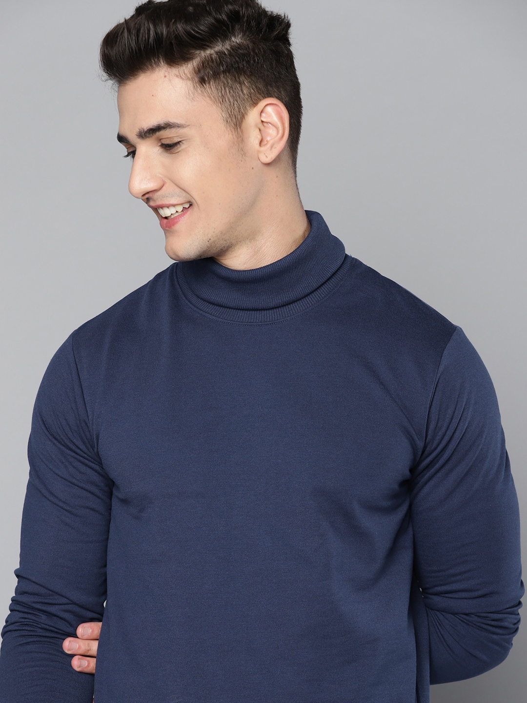 

Mast & Harbour Men Navy Blue Solid Turtle Neck Sweatshirt