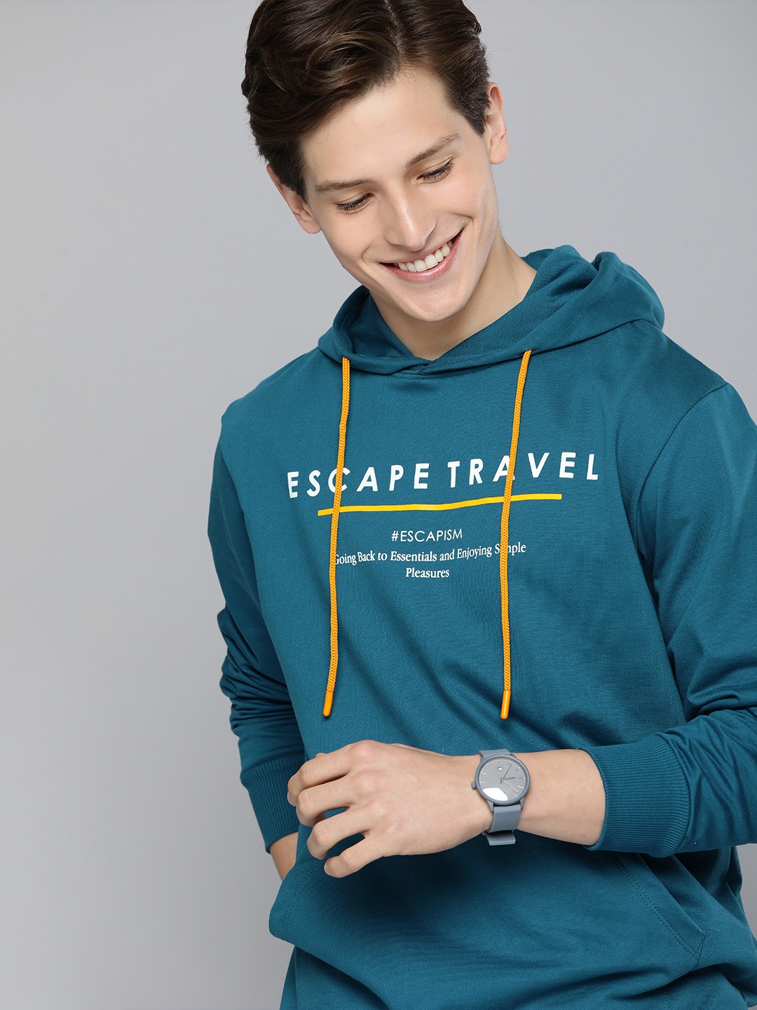 

Mast & Harbour Men Teal Typographical Printed Hooded Sweatshirt