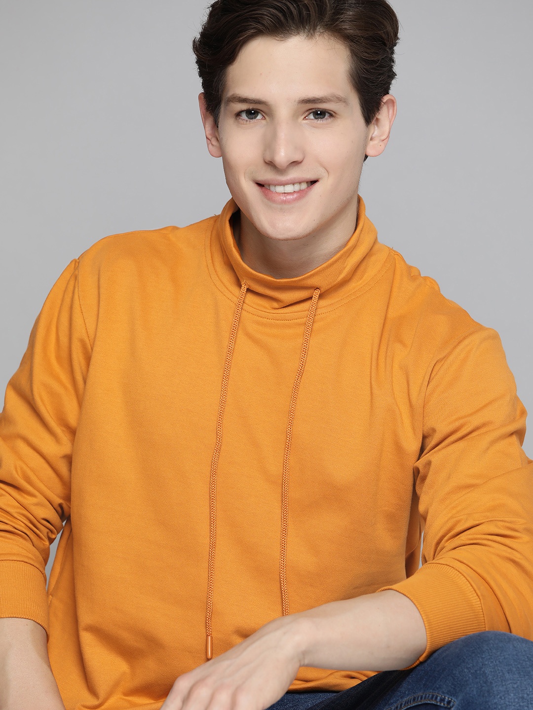 

Mast & Harbour Men Orange Solid Sweatshirt