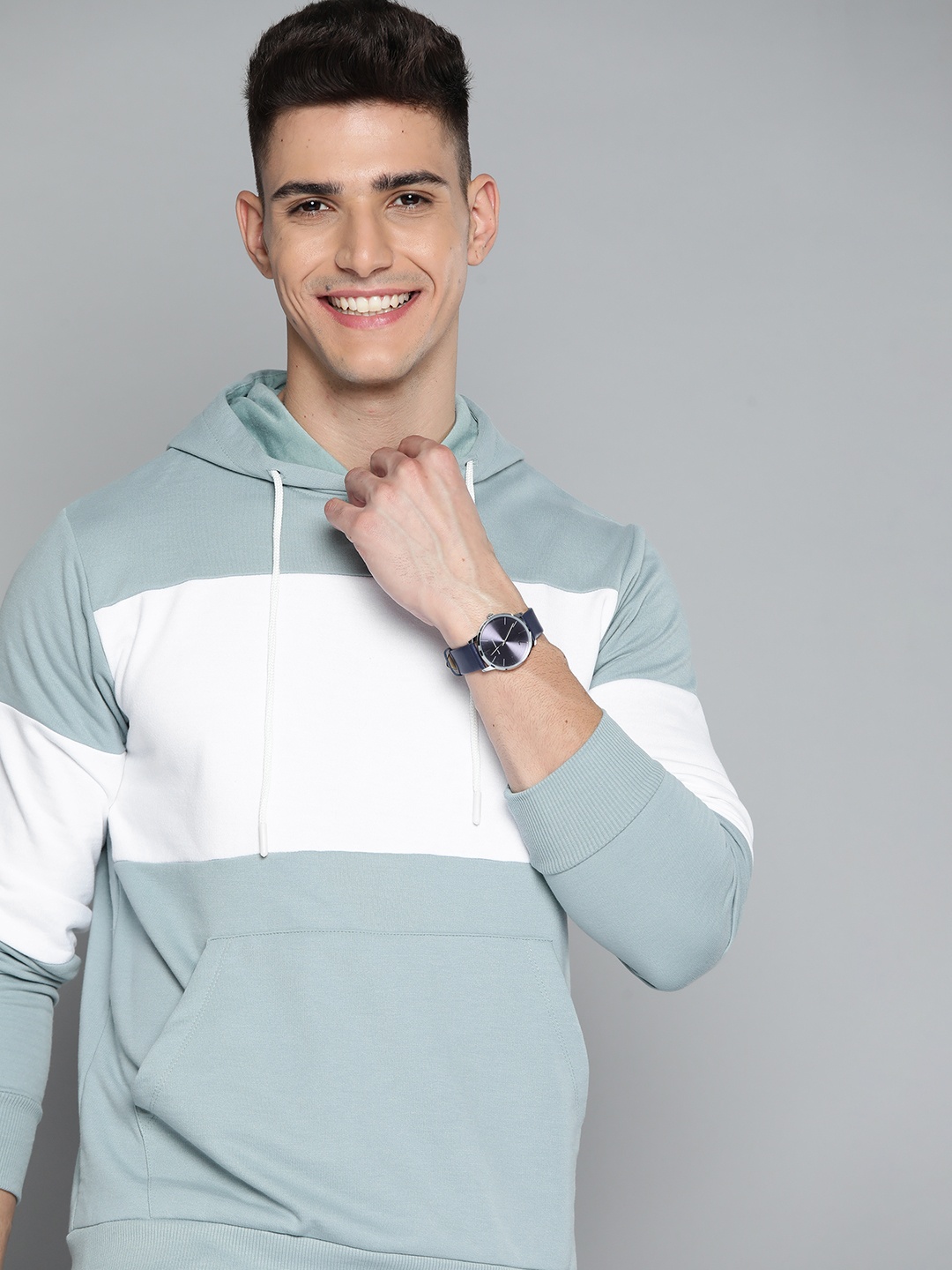 

Mast & Harbour Men Blue & White Colourblocked Hooded Sweatshirt