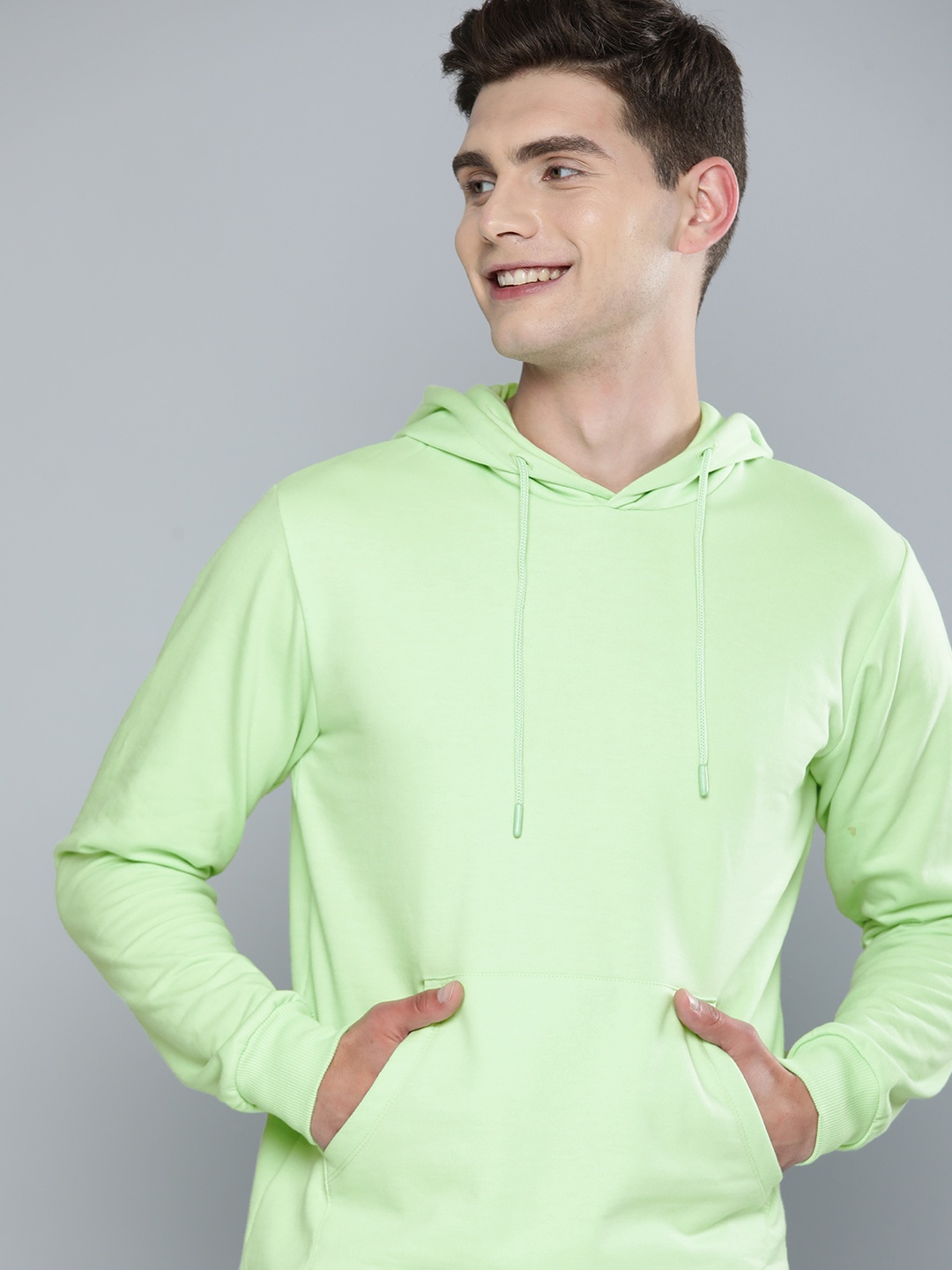 

Mast & Harbour Men Pastel Green Solid Hooded Sweatshirt