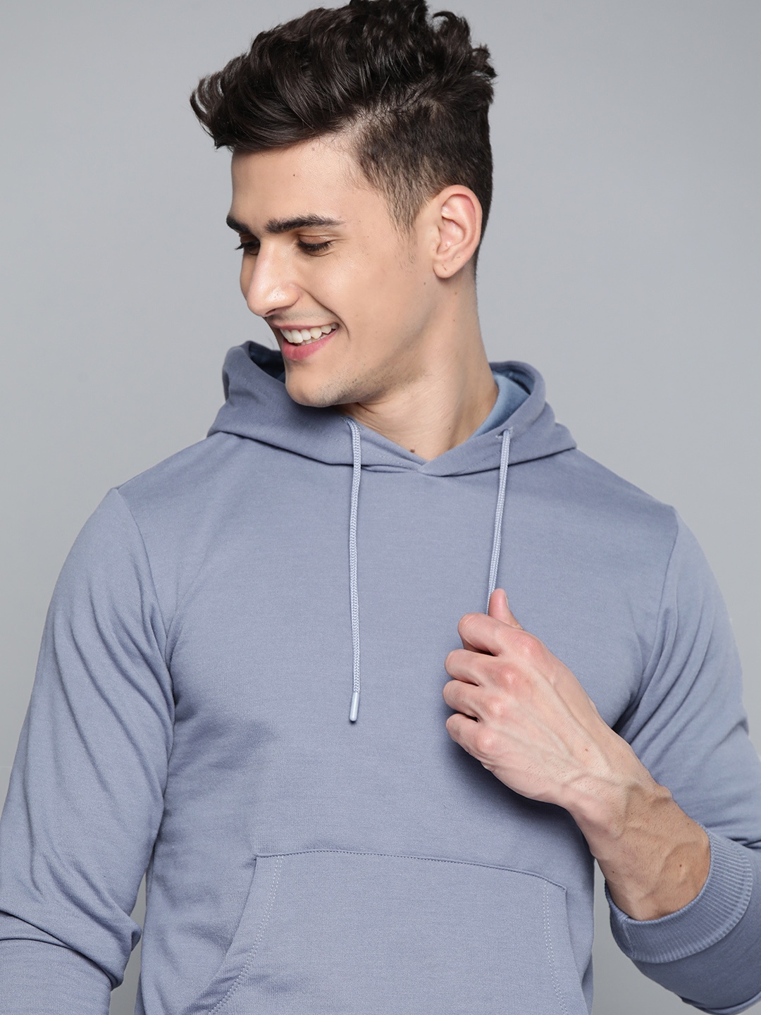 

Mast & Harbour Men Blue Solid Hooded Sweatshirt