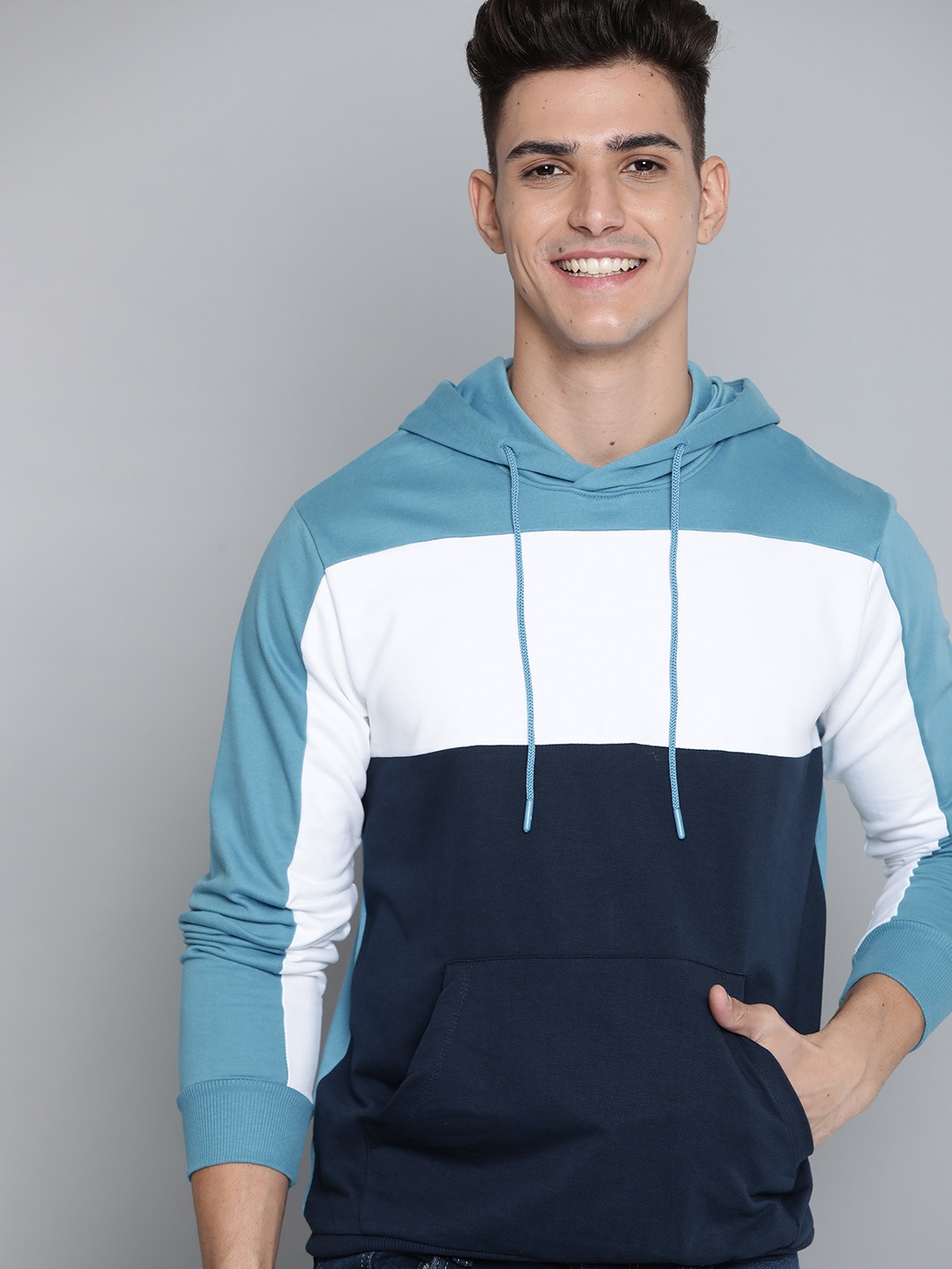 

Mast & Harbour Men Blue & White Colourblocked Hooded Sweatshirt