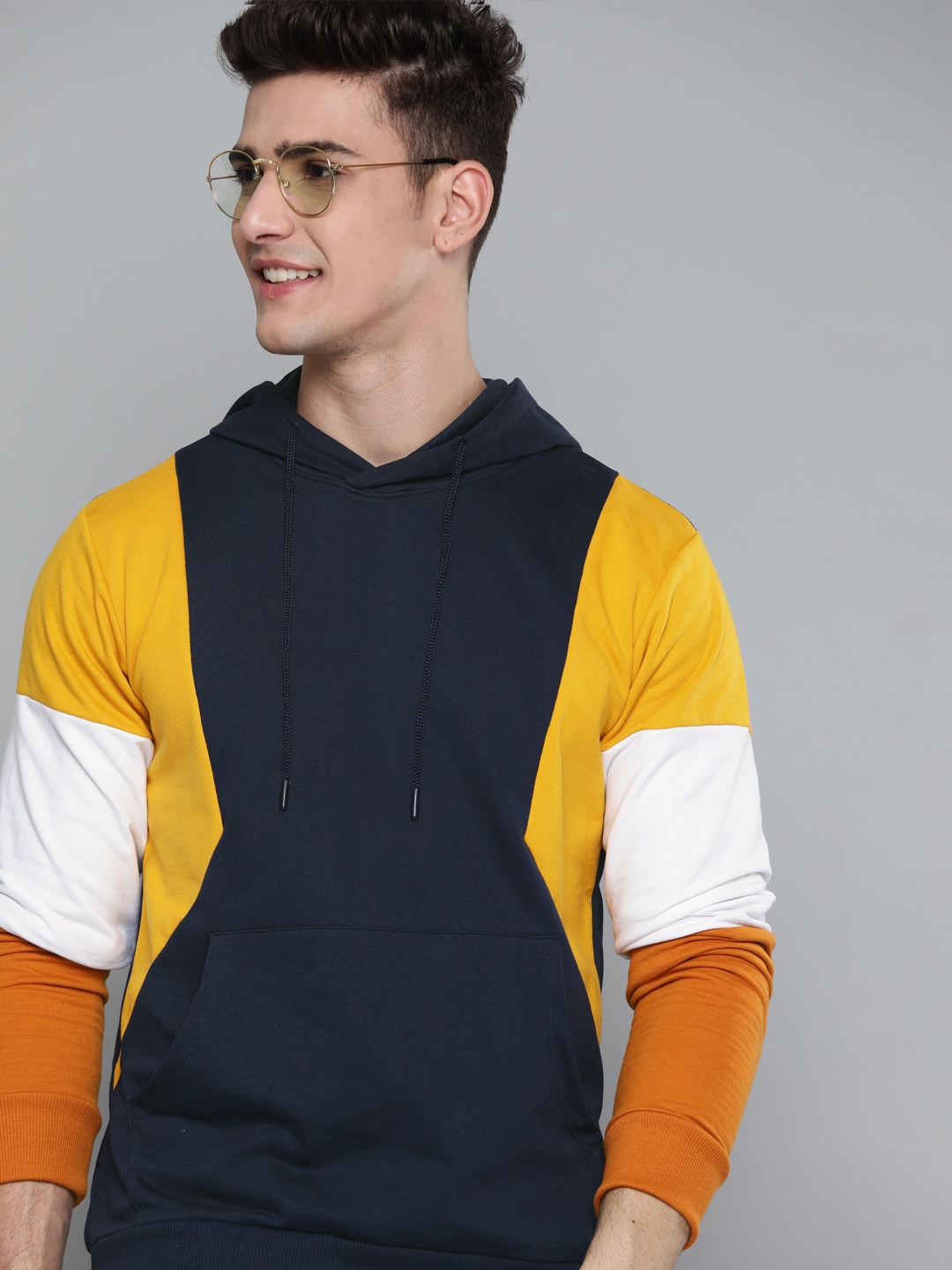 

Mast & Harbour Men Navy Blue & Mustard Yellow Colourblocked Hooded Sweatshirt