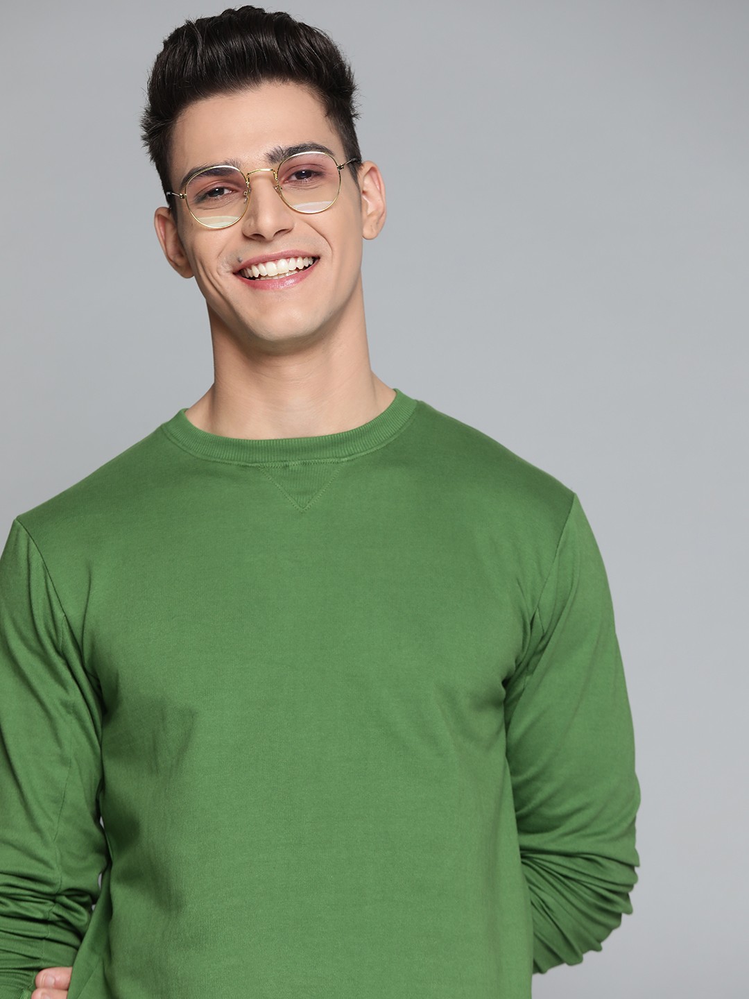 

Mast & Harbour Men Green Solid Sweatshirt