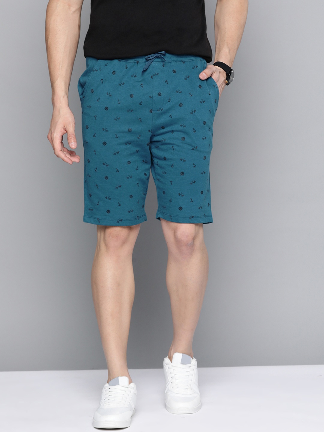 

Mast & Harbour Men Teal Blue & Black Conversational Printed Shorts