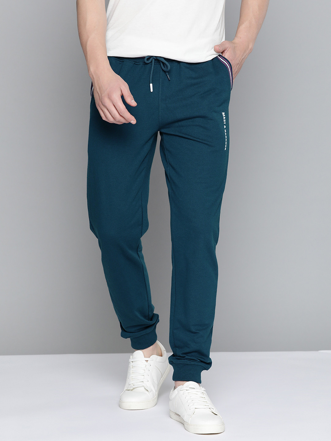 

Mast & Harbour Men Teal Brand Logo Printed Joggers