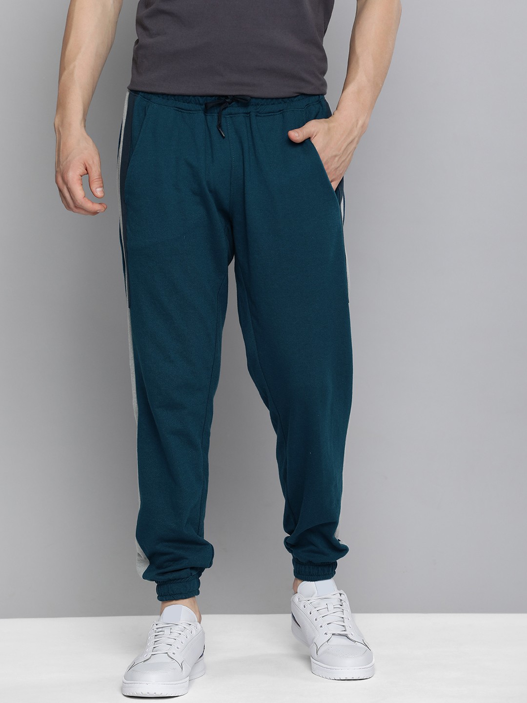 

Mast & Harbour Men Teal Blue Solid Joggers With Contrast Side Stripes
