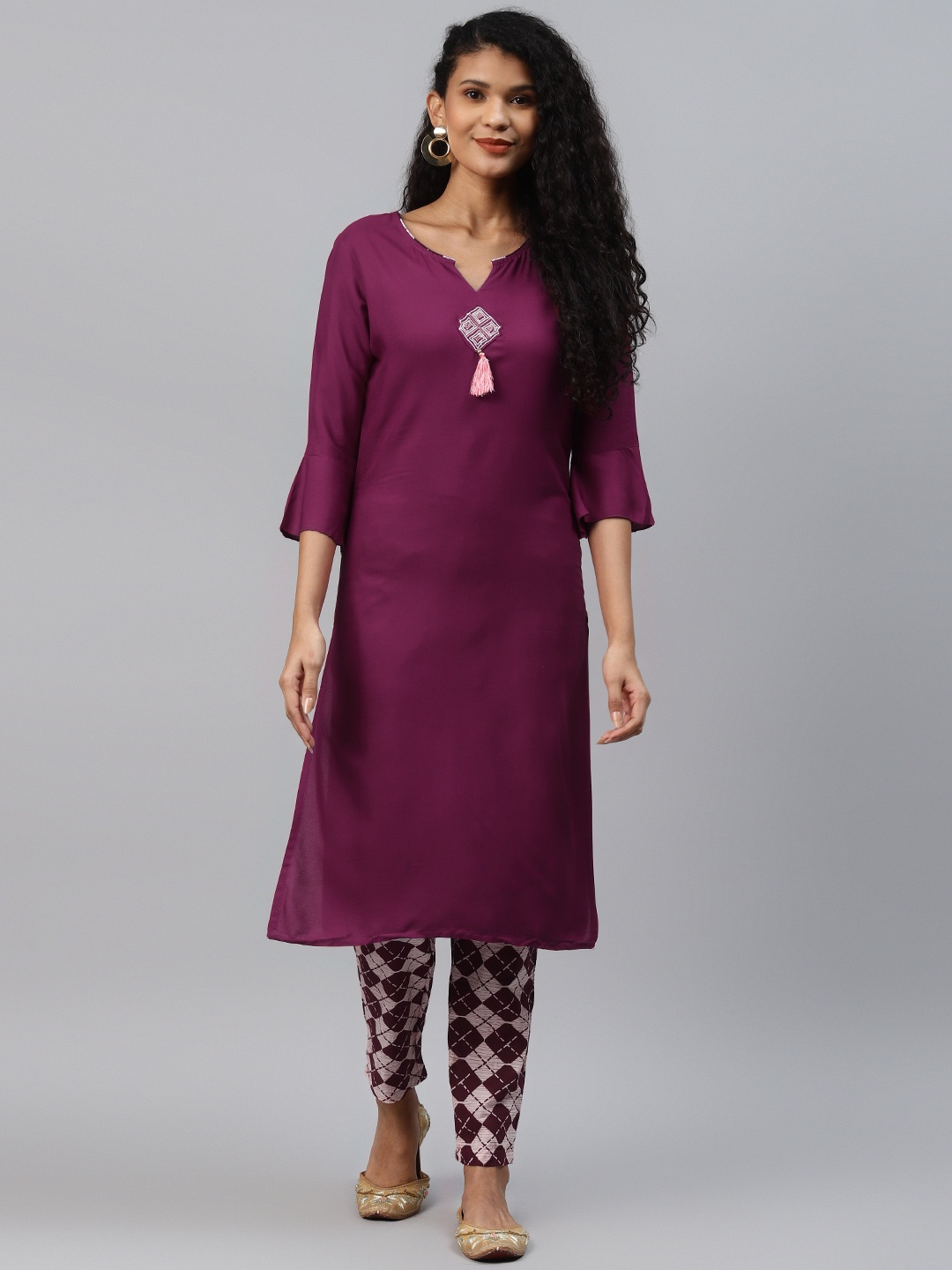 

Yufta Women Purple Solid Bell Sleeves Straight Kurta with Tassel Detail
