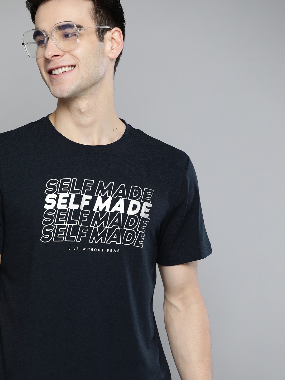 

Mast & Harbour Men Navy Blue & White Handcrafted Typography Printed T-shirt