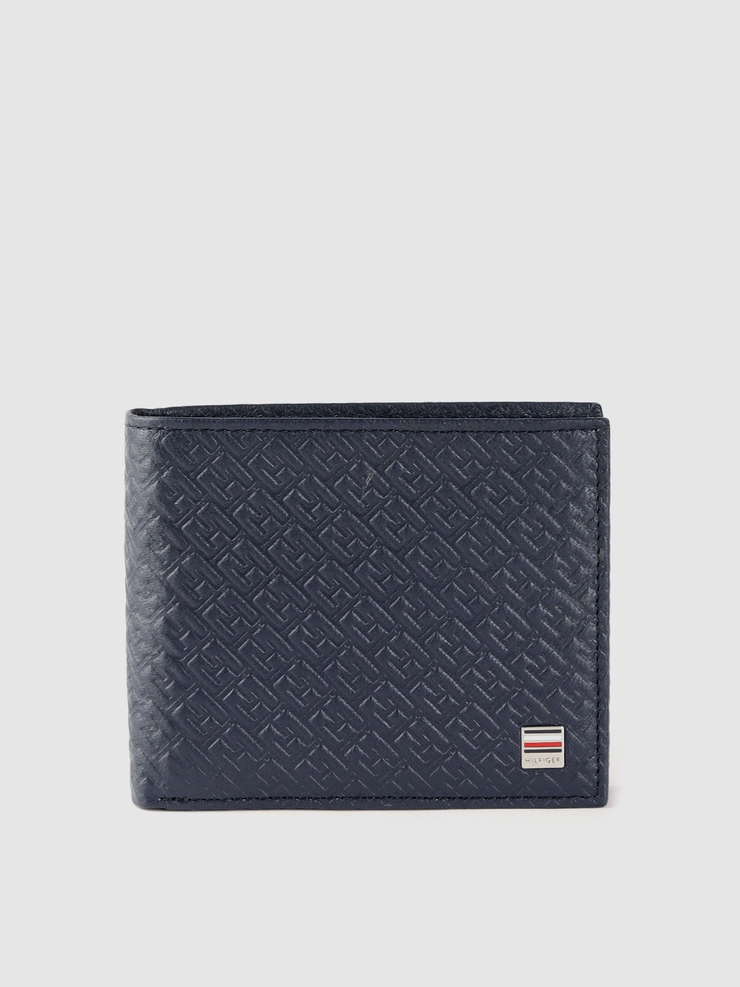 

Tommy Hilfiger Men Navy Blue Embossed Textured Leather Two Fold Wallet