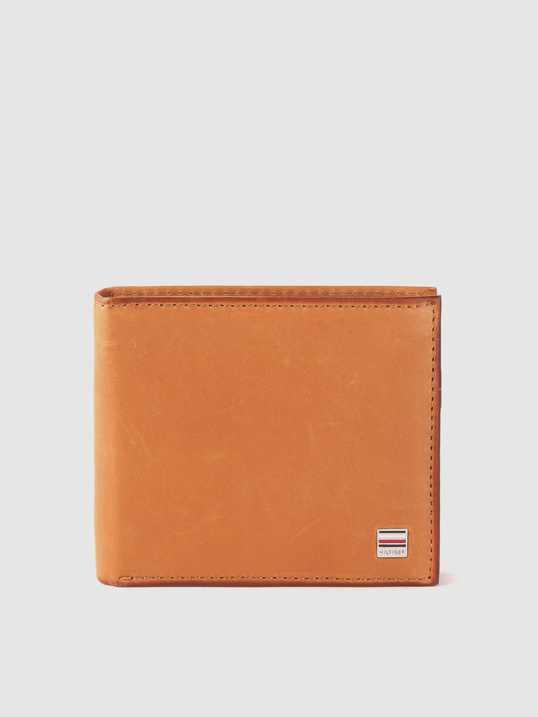 

Tommy Hilfiger Men Tan Brown Solid Leather Two Fold Wallet