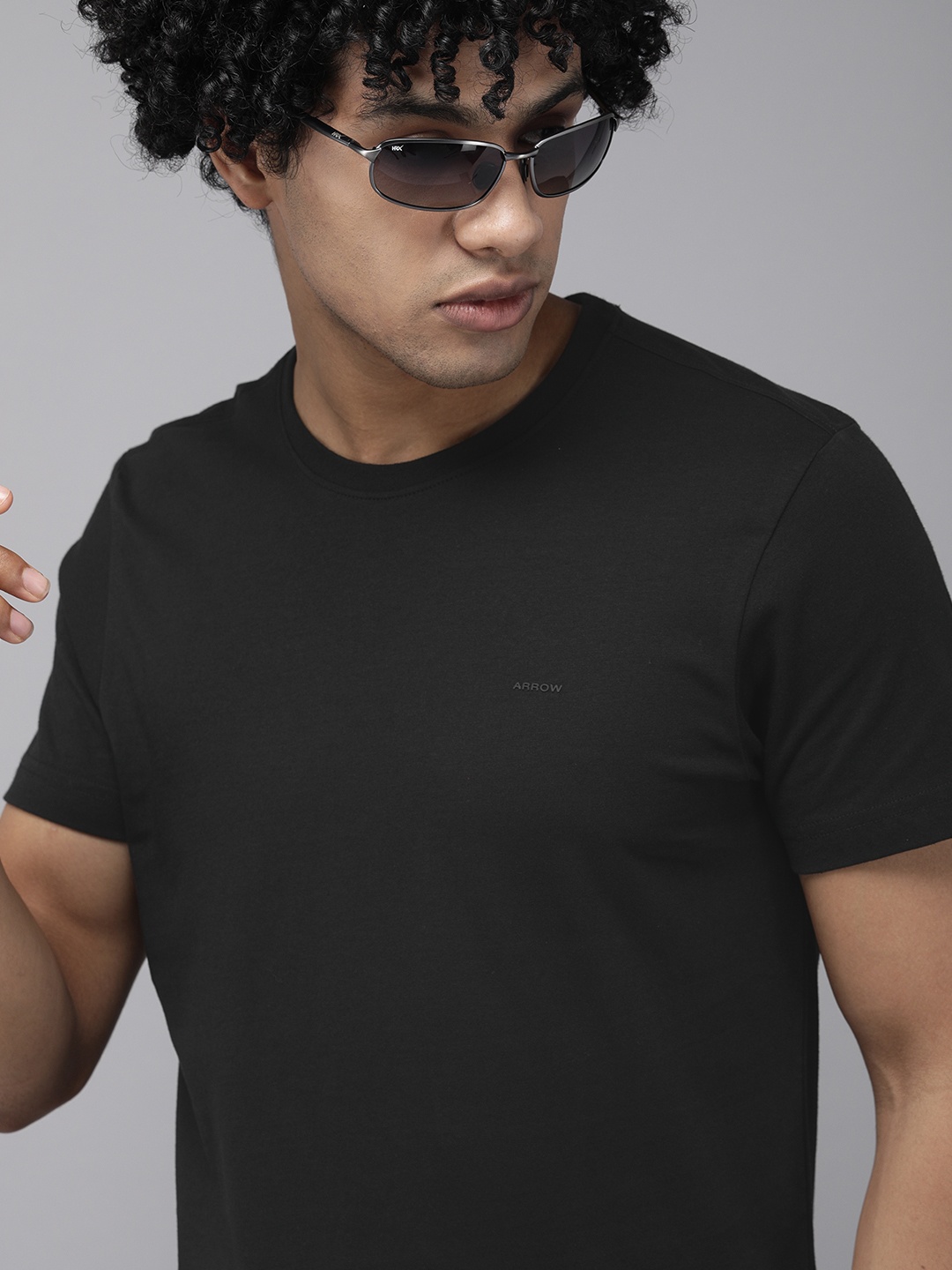 

Arrow Sport Men Black Solid Casual Pure Cotton T-shirt