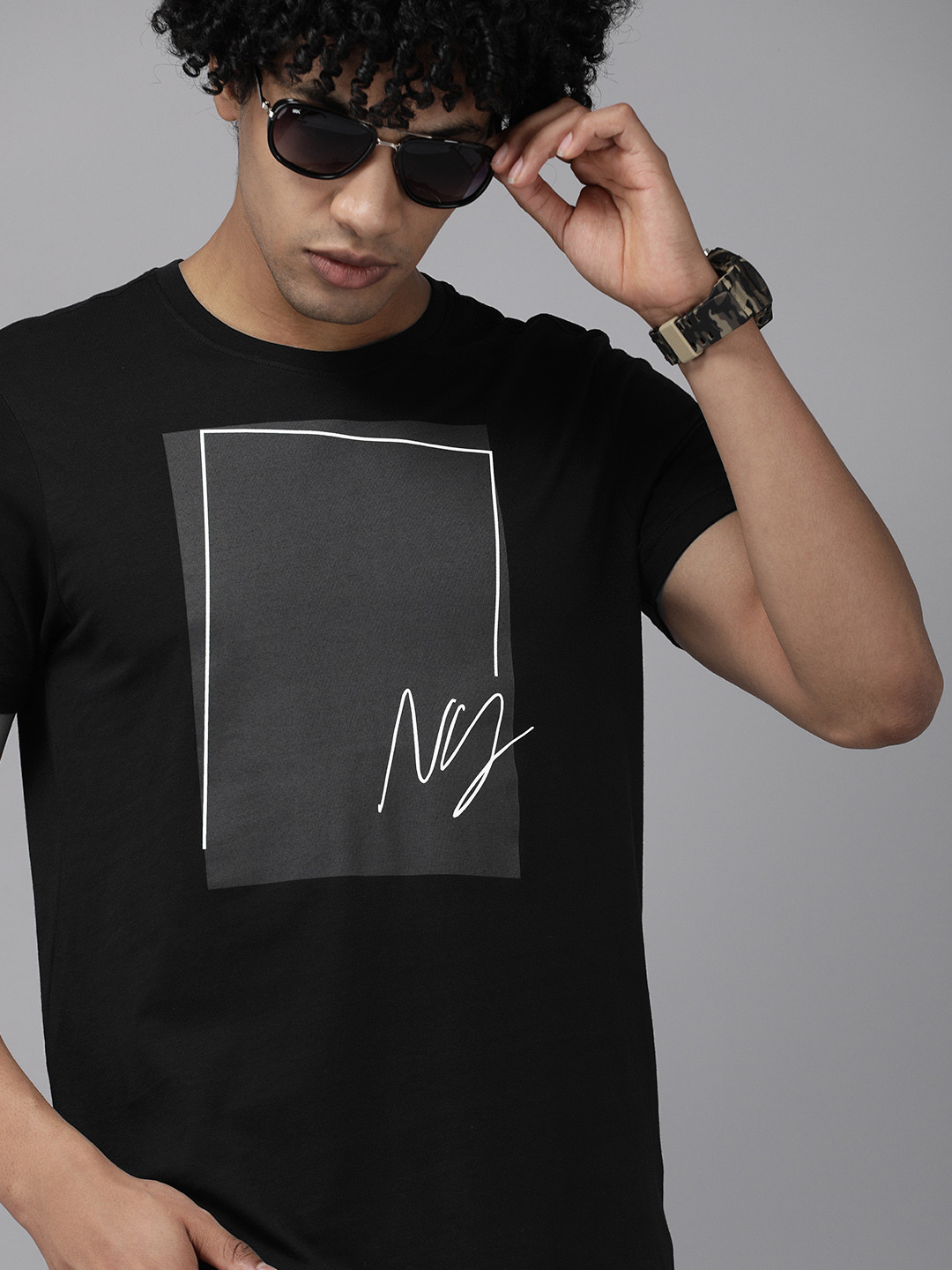 

Arrow Sport Men Black White Printed Casual Pure Cotton T-shirt