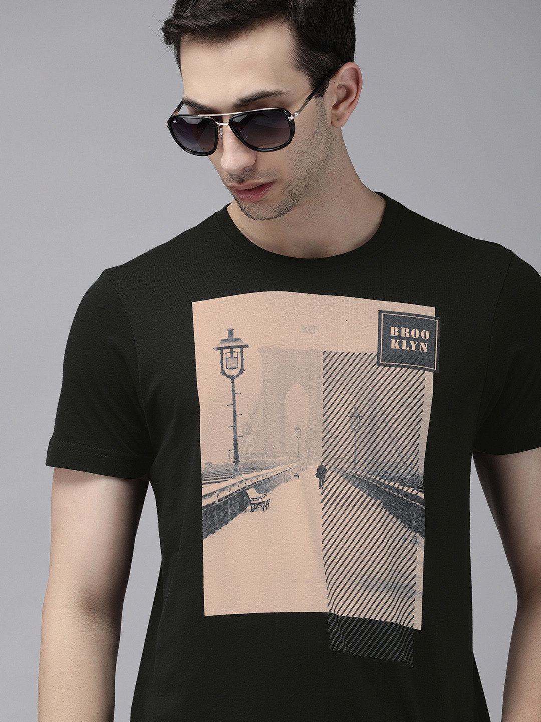 

Arrow Sport Men Black Printed Pure Cotton T-shirt