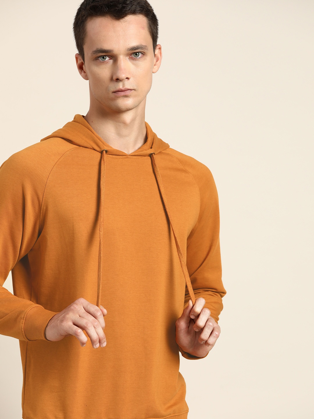 

ether Men Mustard Brown Solid Hooded Sweatshirt