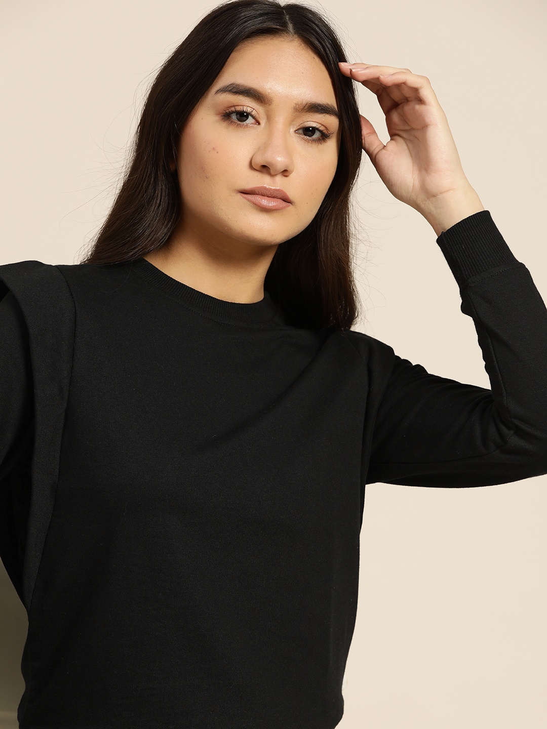

ether Women Black Solid Sweatshirt