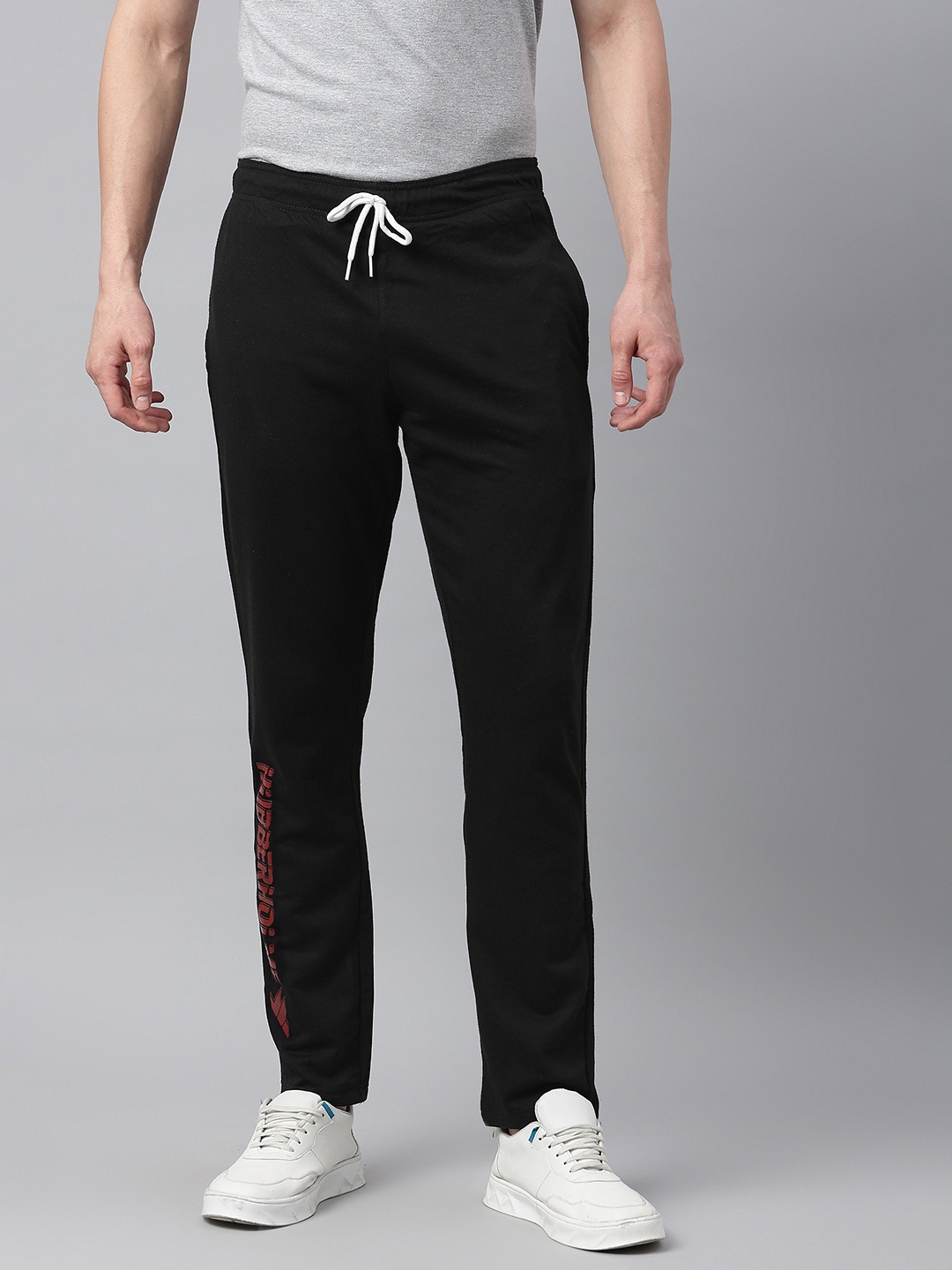

Hubberholme Men Black Brand Logo Printed Slim Fit Knitted Track Pants